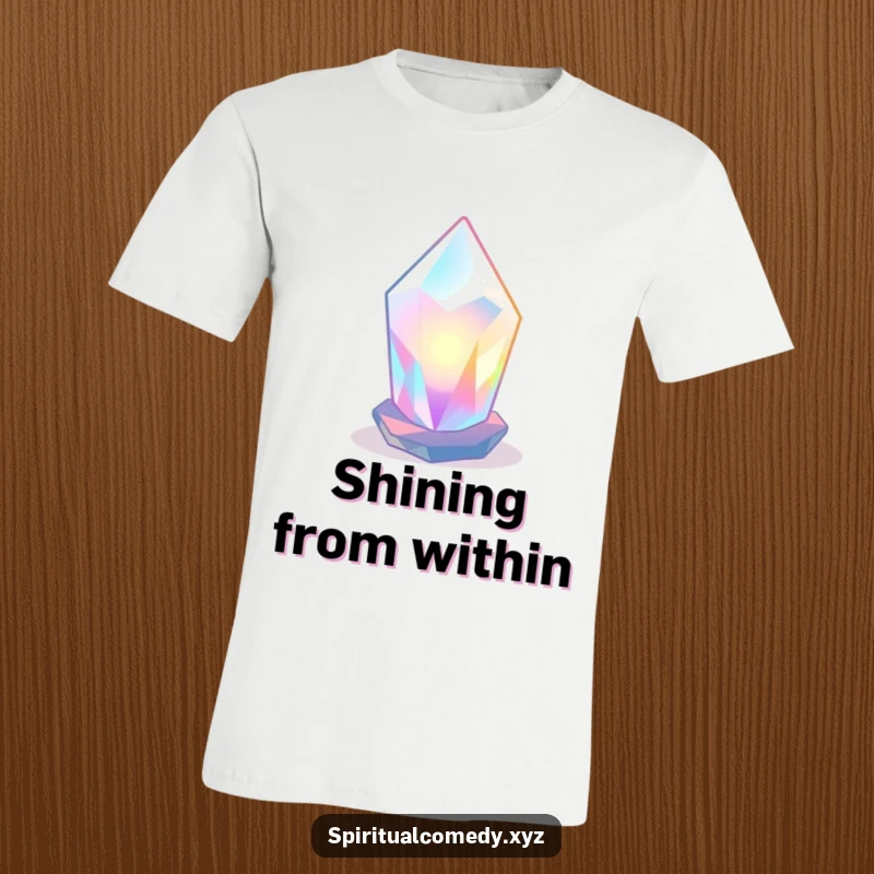 Funny t-shirt with a stylized, luminous crystal radiating soft colored light in a tranquil space, humorous zen apparel.